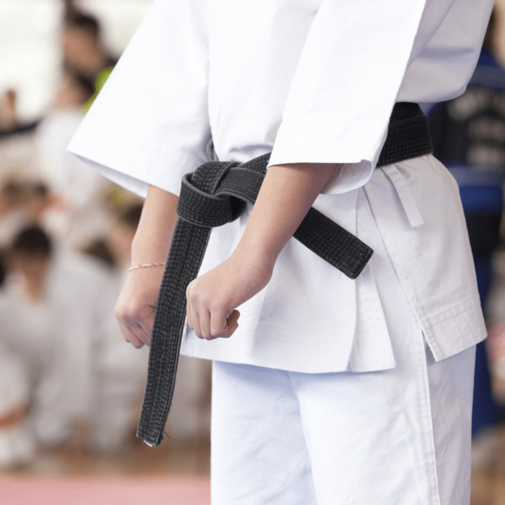 Image of a child with a black belt